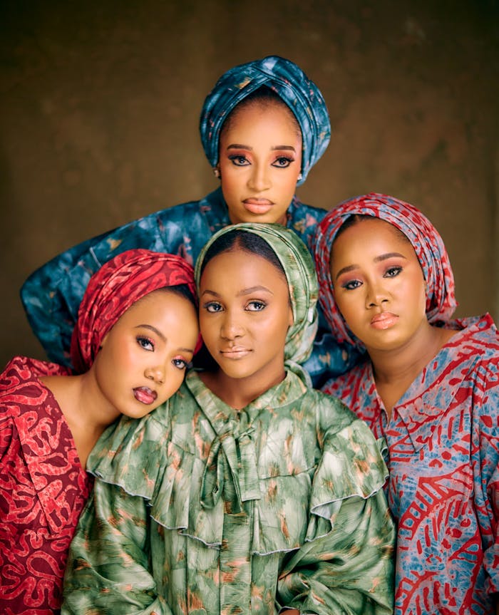 elegant-group-portrait-of-women-in-vibrant-attire-34831566